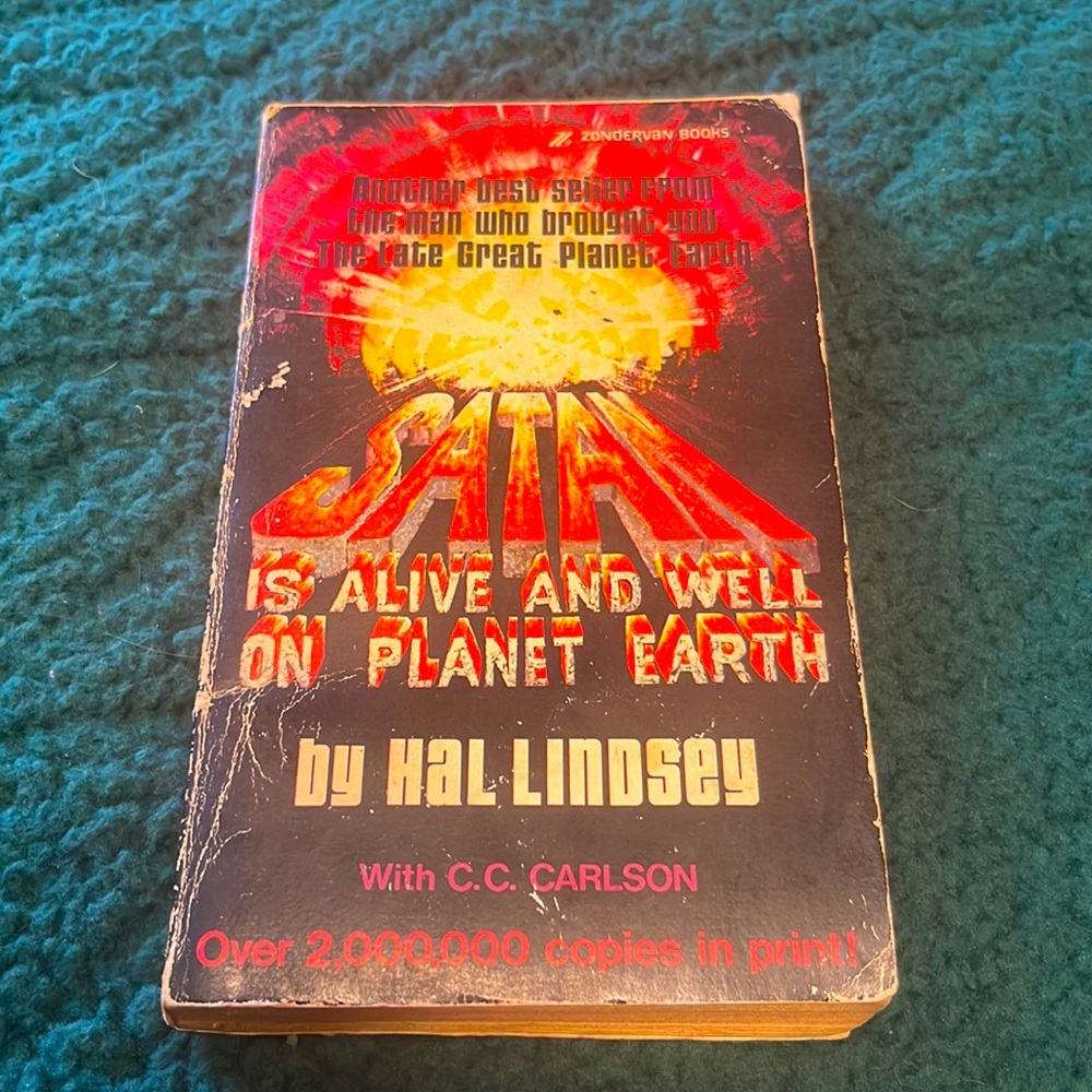 Vintage 1972 paperback Satan is alive & well on planet earth book by Hal Lindsey